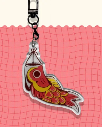 Llavero Koinobori naranja con detalles amarillos acrílico