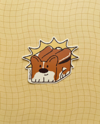 Sticker vinil matte Topper Pan 10x8 cm, corgi ChimChim asomándose entre rebanadas de pan, contorno recortado ChimChim México
